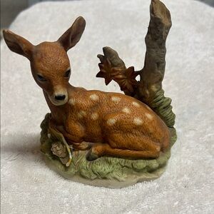 This is a vintage Homco ceramic figurine of a fawn with a squirrel 8879